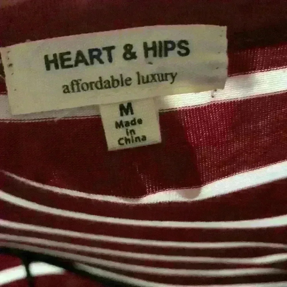 Brand: Heart & Hips
Red and soft white striped short sleeve dress. - Picture 5 of 6